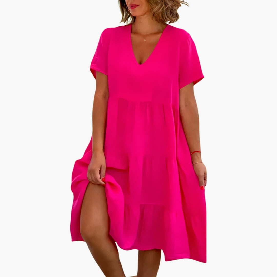 Abito donna con scollo a V, taglio ampio e gonna a balze