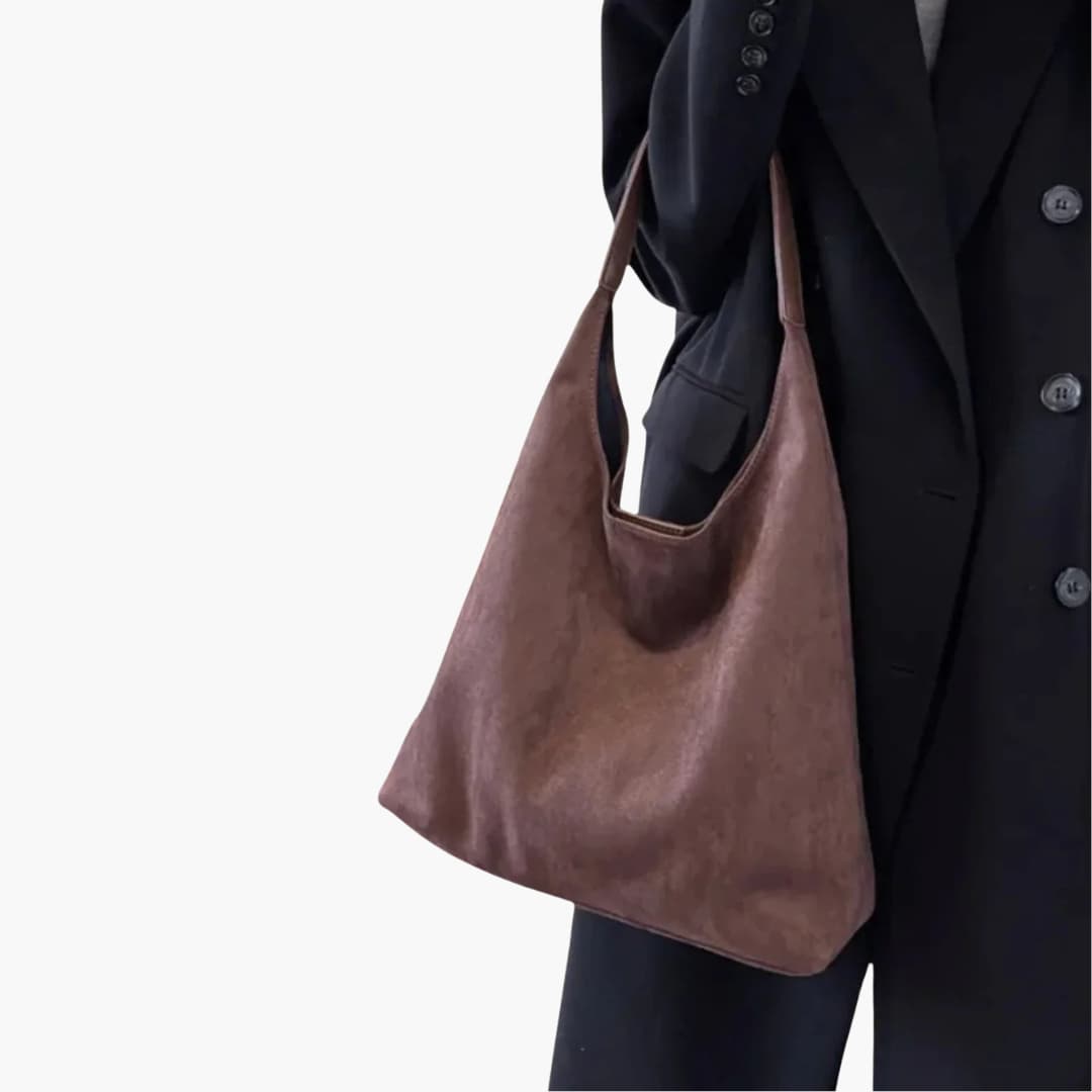 Borsa a mano per donna dal design essenziale tracolla regolabile