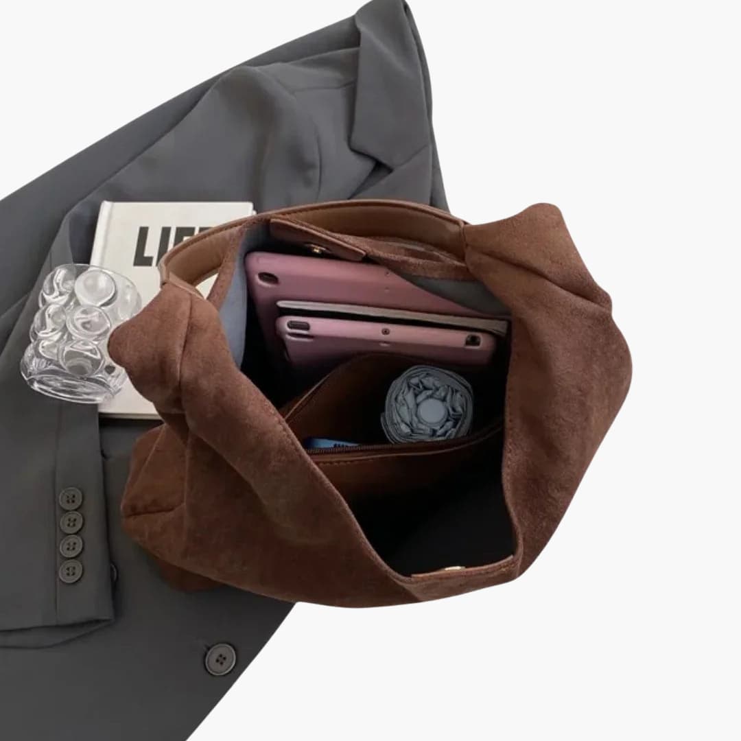 Borsa a mano per donna dal design essenziale tracolla regolabile