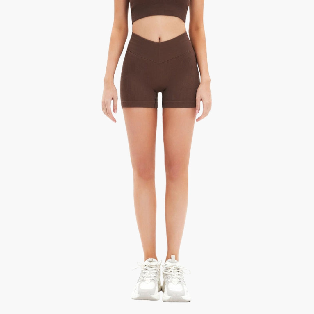 Kort sportsshorts til kvinder med høj talje og ribbet mønster