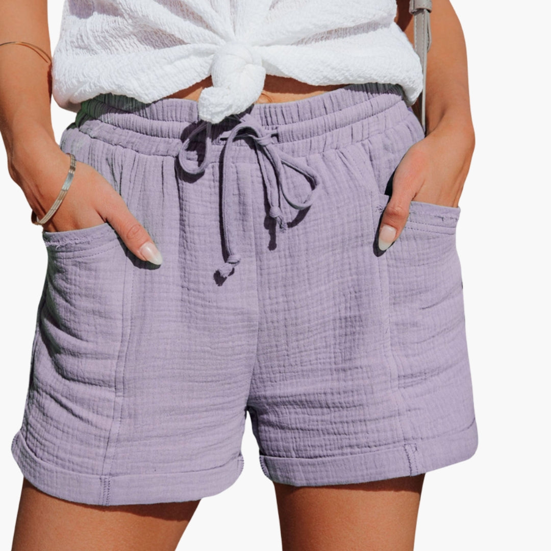 Calções femininos com cintura elástica e bolsos