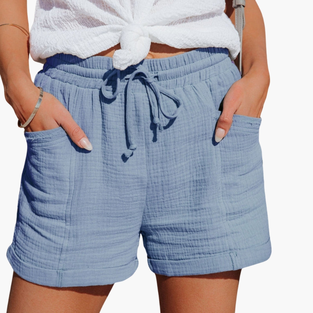 Calções femininos com cintura elástica e bolsos
