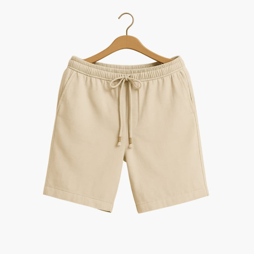 Short homme a taille à poches latérales et  surface unie